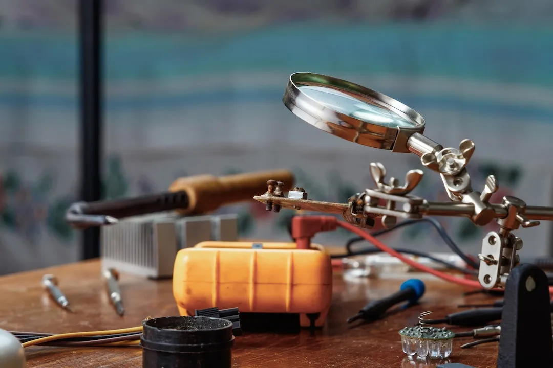 Electronics repair tools on a workbench